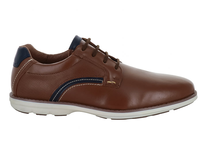 Zapato casual Nevada color miel con detalles en azul marino y suela blanca para hombre.