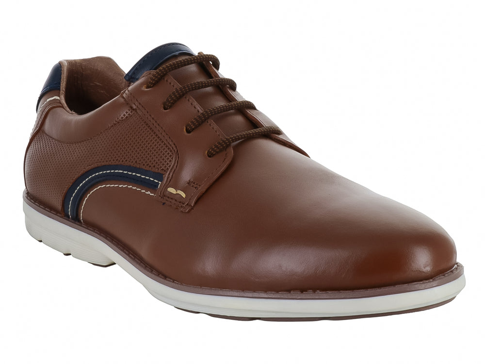 Zapato casual Nevada color miel con detalles en azul marino y suela blanca para hombre.