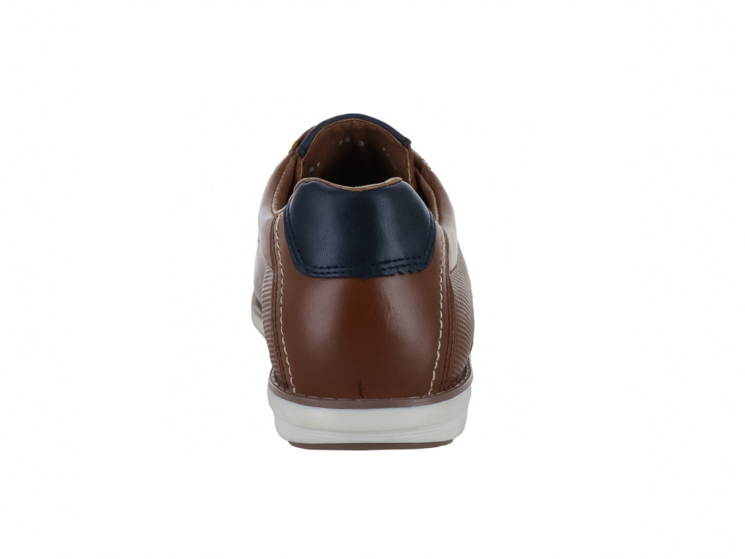 Zapato casual Nevada color miel con detalles en azul marino y suela blanca para hombre.