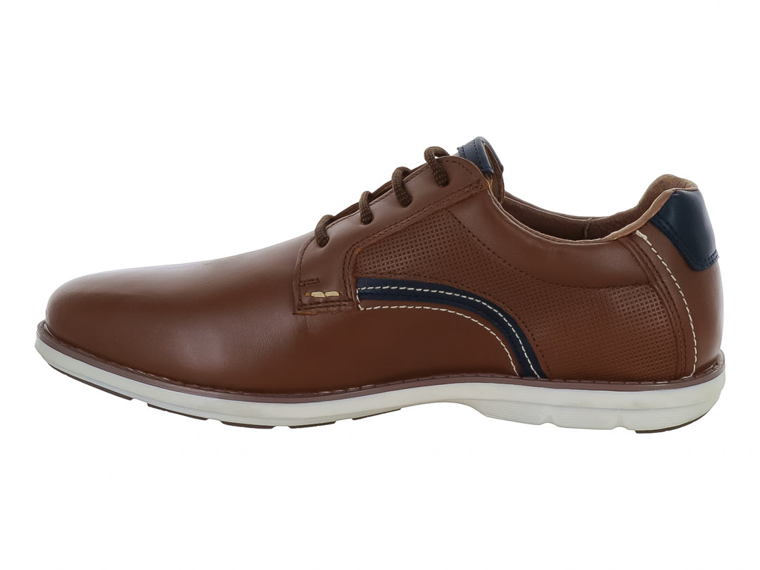 Zapato casual Nevada color miel con detalles en azul marino y suela blanca para hombre.