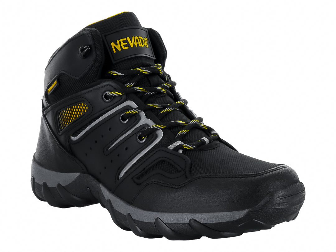 Zapato deportivo tipo botín color negro con detalles en amarillo y suela gris.