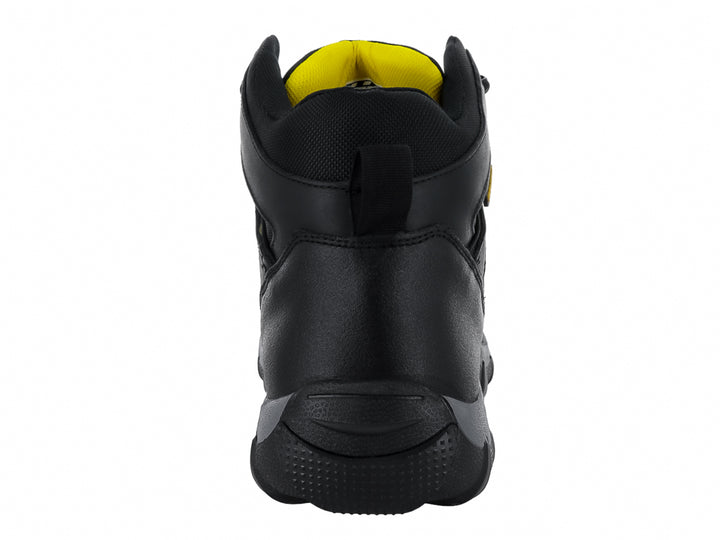 Zapato deportivo tipo botín color negro con detalles en amarillo y suela gris.