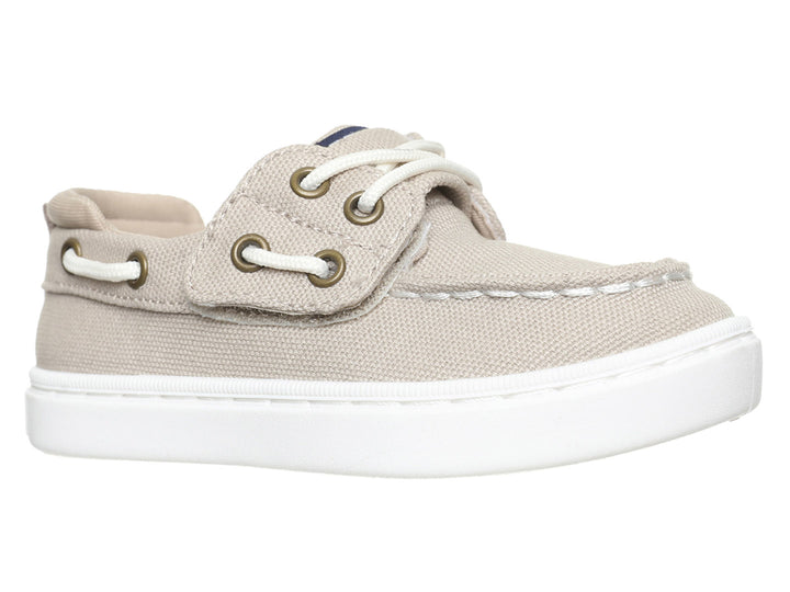 Zapato náutico infantil Sperry color khaki con suela blanca y cordones.
