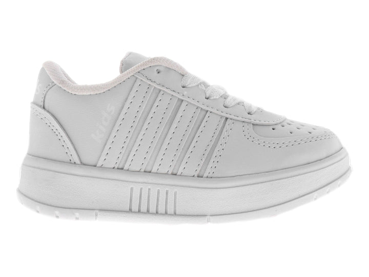 Tenis escolares blancos para niño con agujetas y suela blanca.