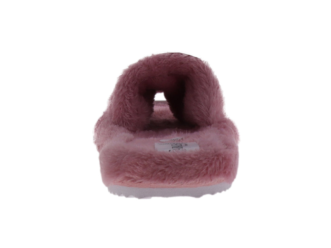 Pantufla abierta de color rosa palo con textura de peluche y suela blanca.