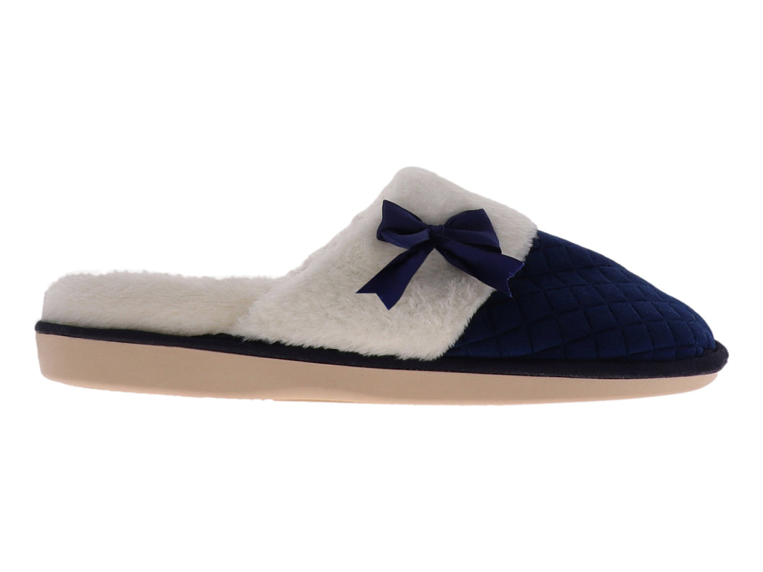 Pantuflas de terciopelo acolchado color marino con interior blanco y un moño decorativo en la parte superior.
