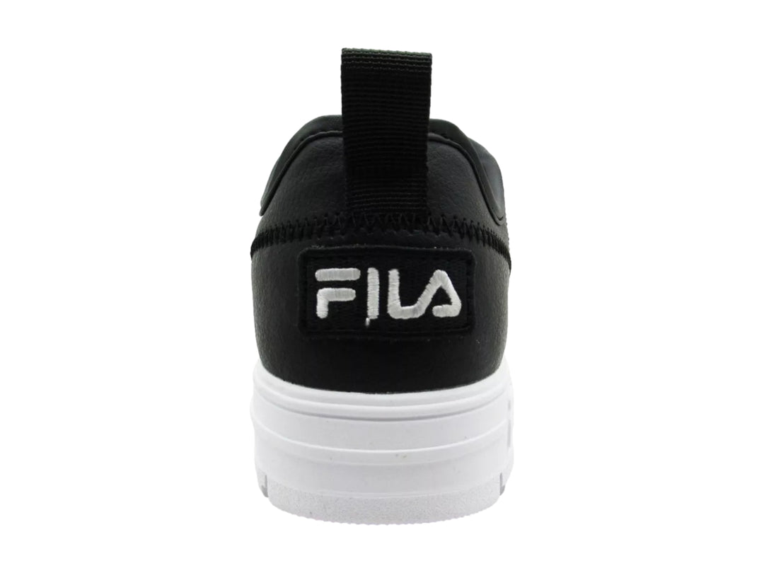Tenis FILA Disruptor Court en color negro con suela blanca de plataforma y relieve dentado.