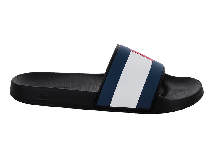 Sandalia slide Tommy Hilfiger color negro con banda tricolor en azul, blanco y rojo.