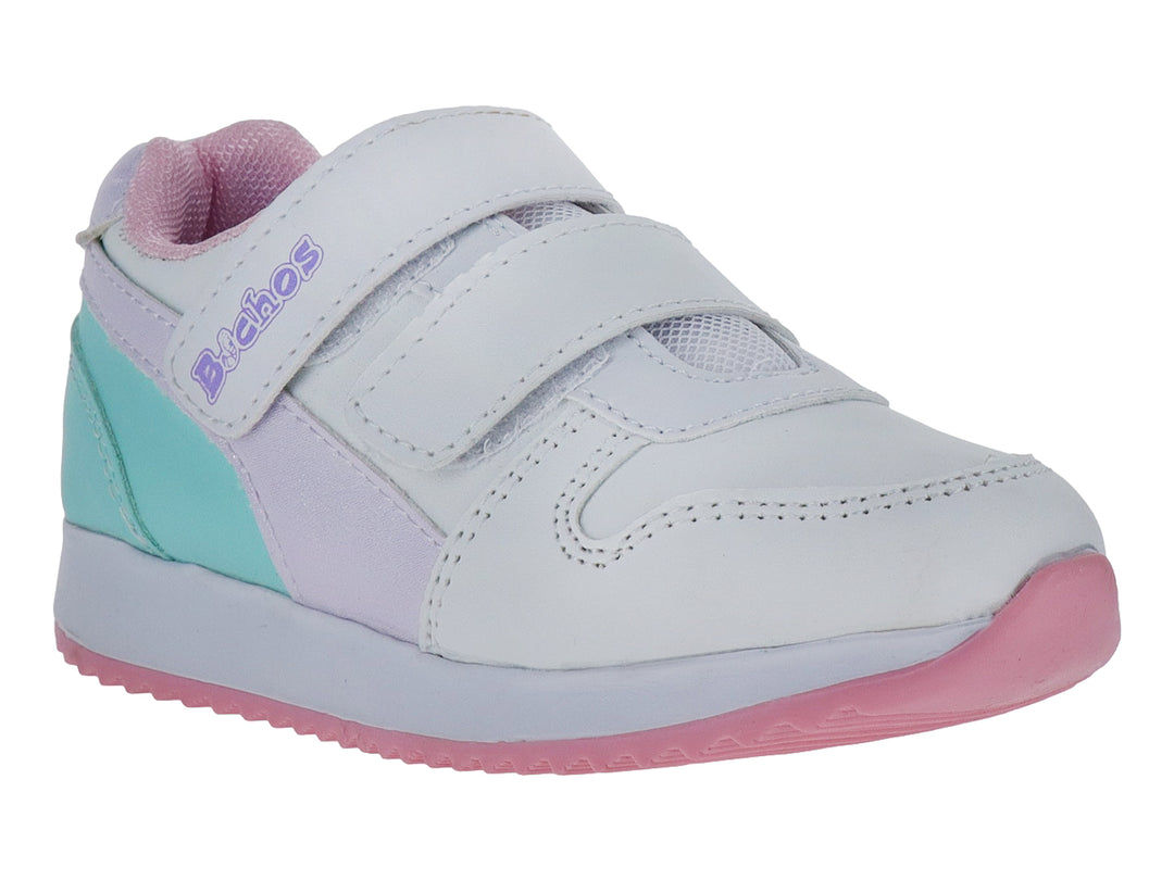Zapato infantil blanco con detalles en lila y verde menta, suela rosa y cierre de velcro.