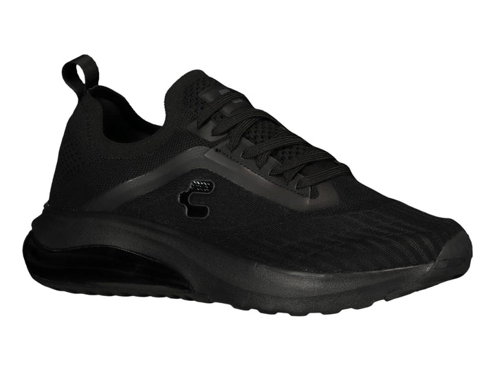 Tenis deportivos Charly de color negro con suela gruesa y tejido transpirable.
