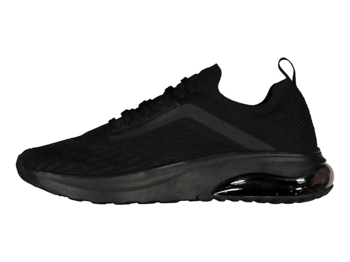 Tenis deportivos Charly de color negro con suela gruesa y tejido transpirable.