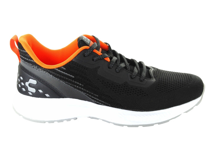 Tenis deportivos Charly color negro con interior naranja y suela blanca.