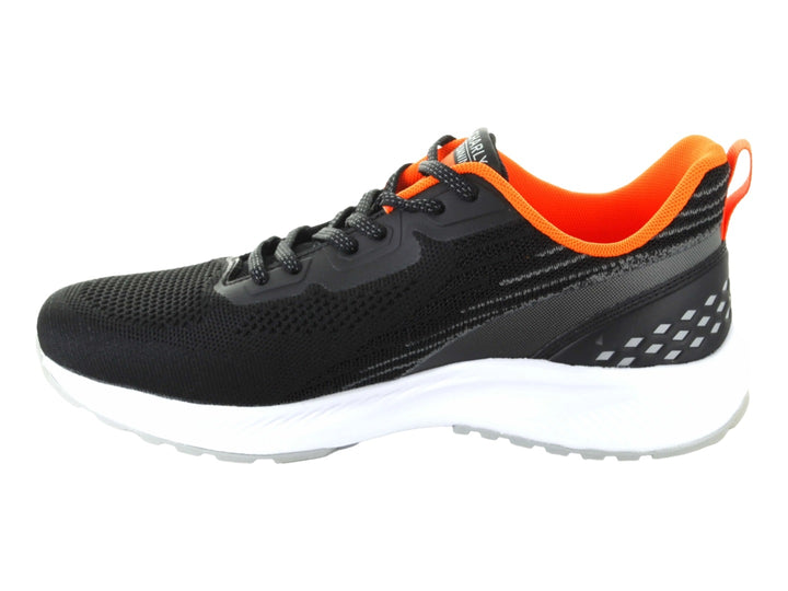 Tenis deportivos Charly color negro con interior naranja y suela blanca.