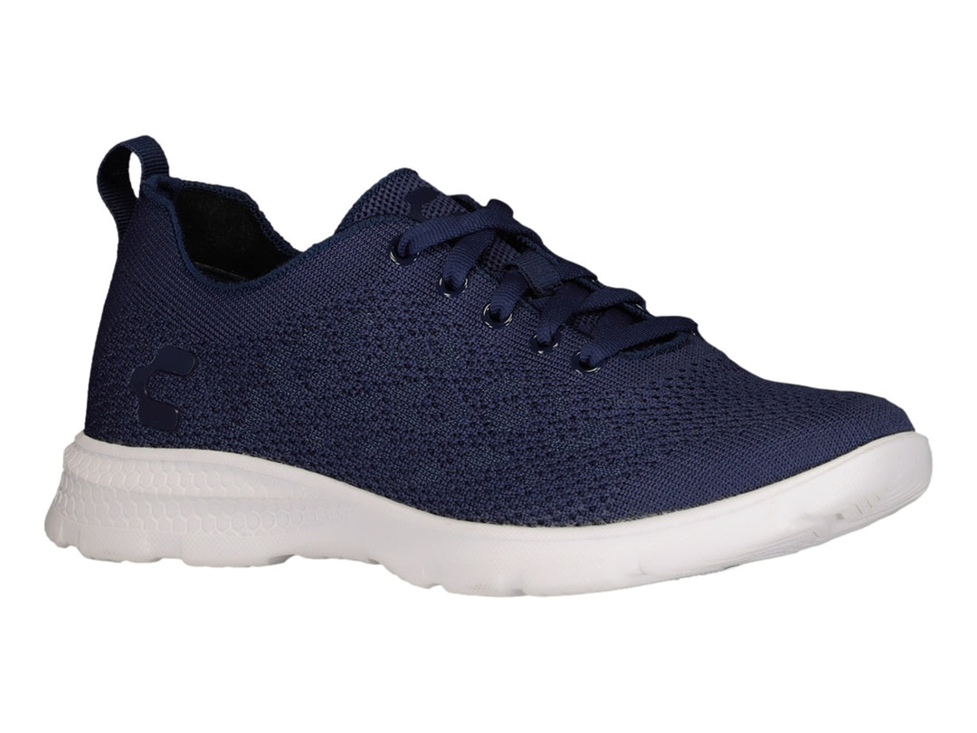 Tenis deportivos Charly en color marino con suela blanca y tejido transpirable.