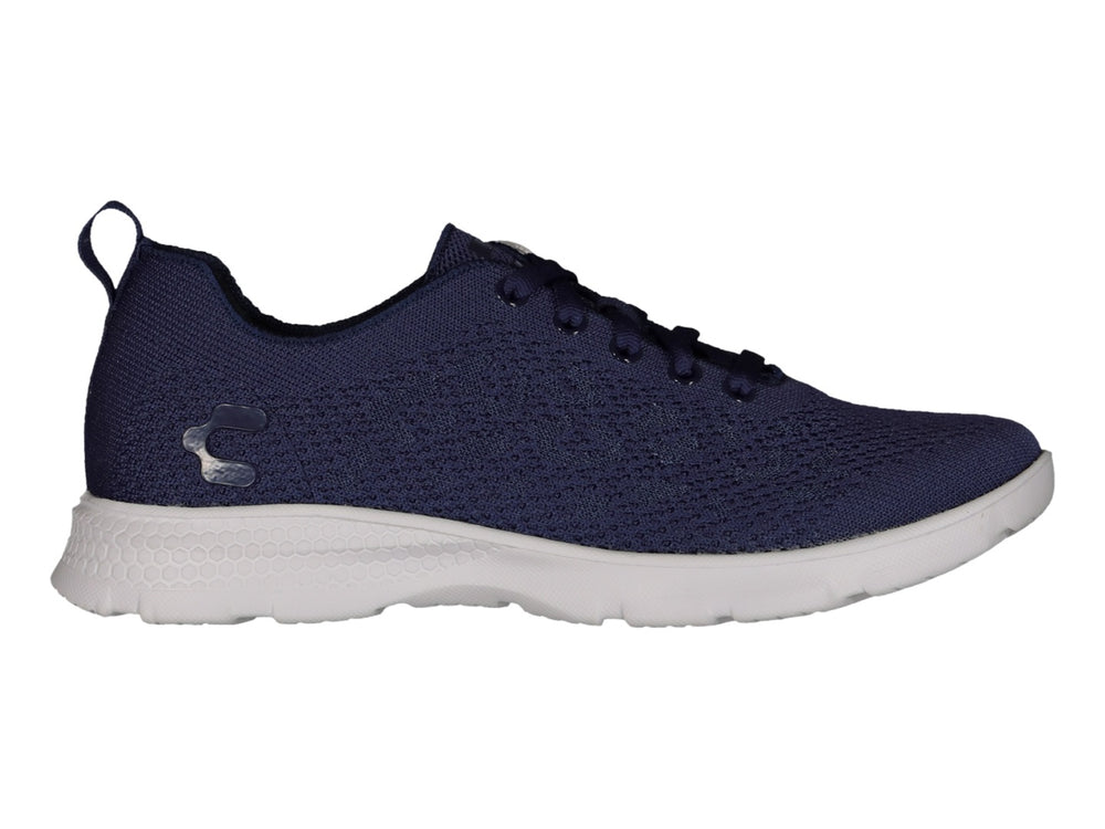 Tenis deportivos Charly en color marino con suela blanca y tejido transpirable.