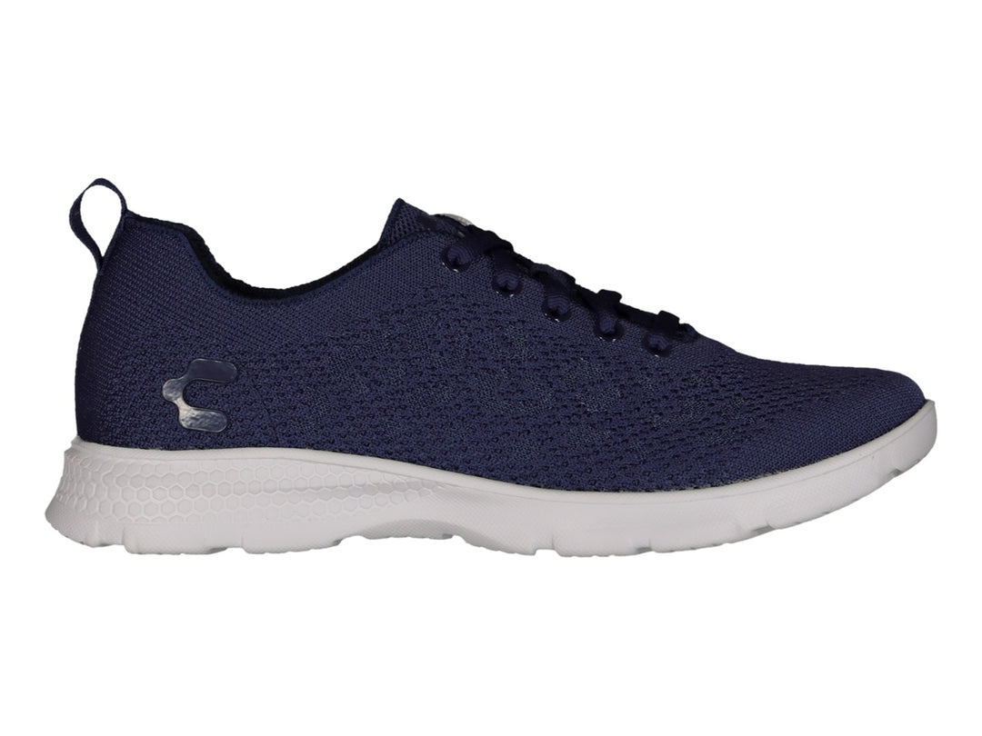 Tenis deportivos Charly en color marino con suela blanca y tejido transpirable.