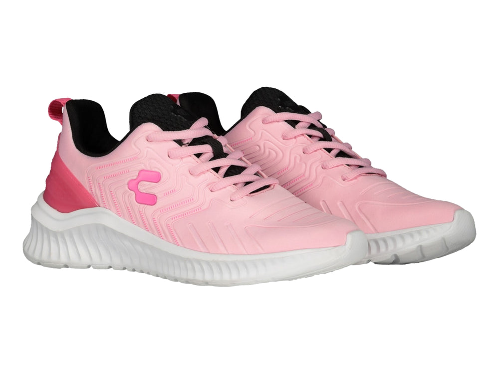Tenis deportivos Charly en color rosa con suela blanca y detalles en negro.