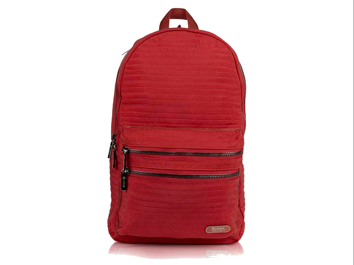 Mochila XTREM color rojo con diseño acolchado y dos bolsillos frontales con cierre negro.