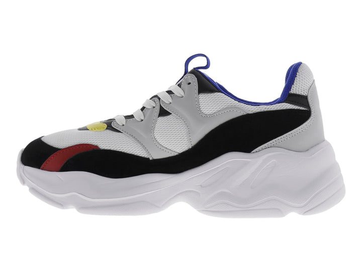 Tenis deportivos chunky color blanco con detalles en negro, azul, rojo y amarillo.