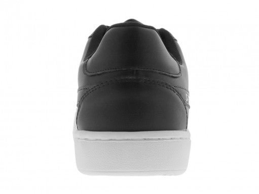 Tenis deportivos Sport Time color negro con franjas laterales blancas y suela blanca.