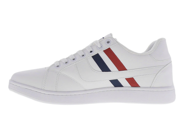 Tenis deportivos blancos con franjas laterales en color rojo y marino, cordones blancos y suela blanca.