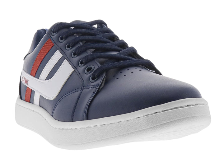 Tenis deportivos color marino con franjas blancas y rojas en el lateral y suela blanca.
