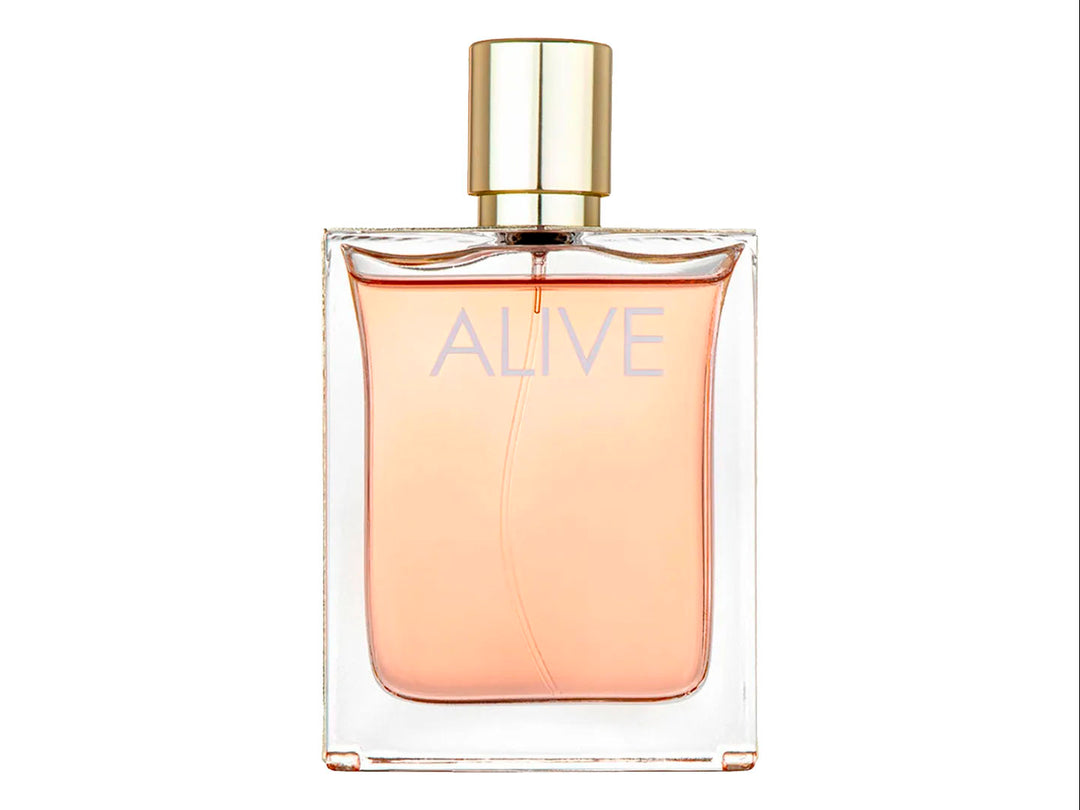 Frasco de perfume Hugo Boss Alive y su caja en color rosa con detalles dorados.