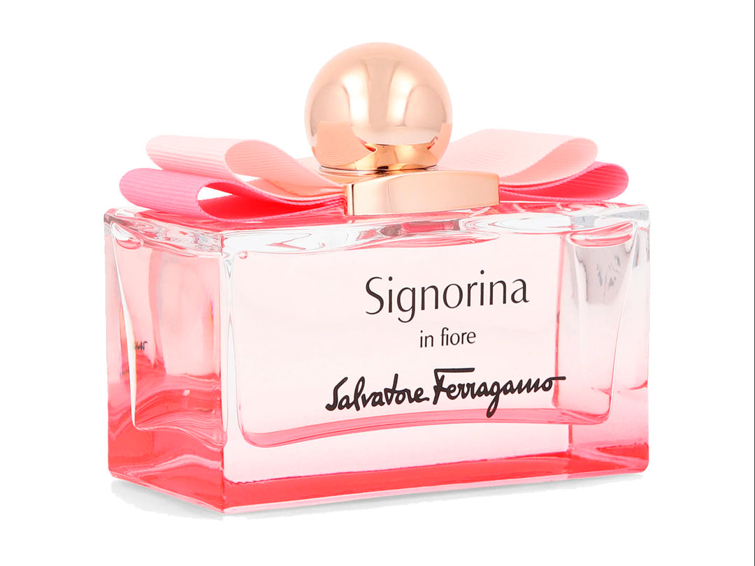 Perfume Salvatore Ferragamo Signorina in Fiore de 100ml con frasco transparente, moño rosa y caja blanca.