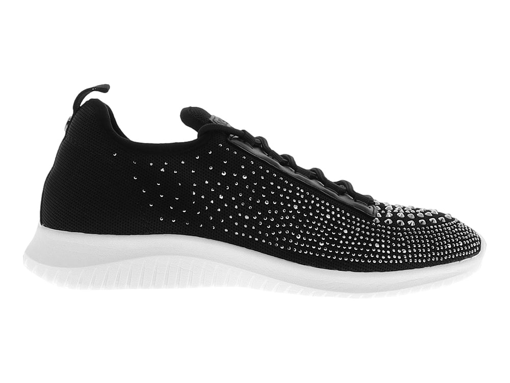 Tenis Nine West color negro con incrustaciones brillantes plateadas y suela blanca gruesa.