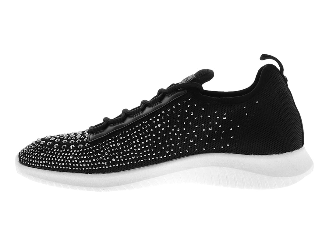 Tenis Nine West color negro con incrustaciones brillantes plateadas y suela blanca gruesa.