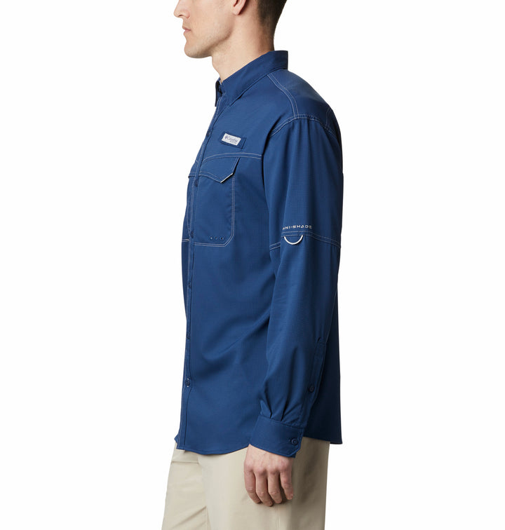 Camisa Columbia Low Drag Offshore azul de manga larga con bolsillos frontales y costuras blancas.