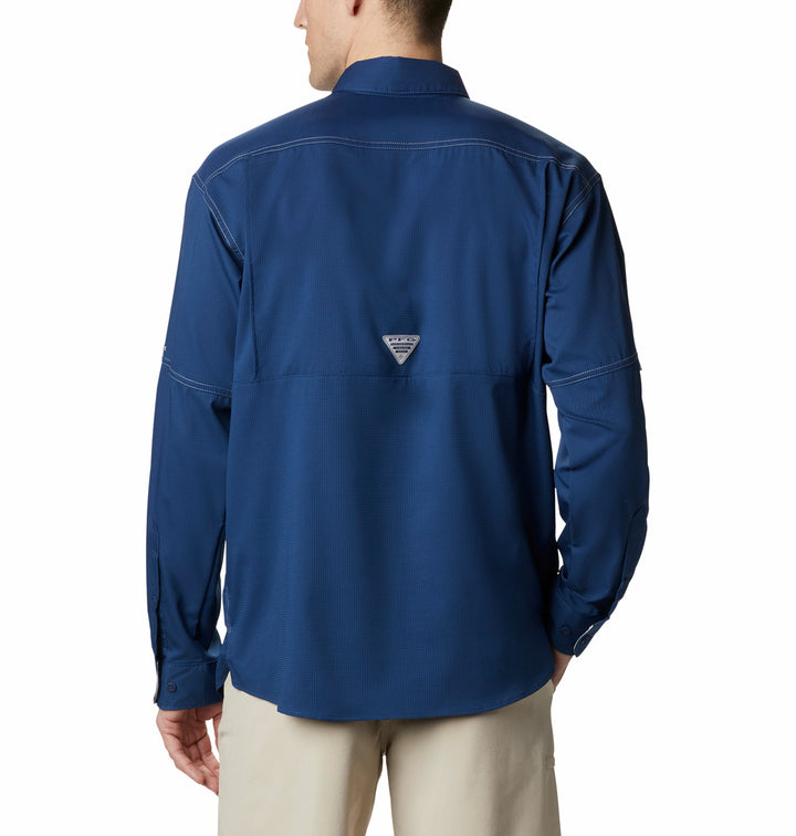 Camisa Columbia Low Drag Offshore azul de manga larga con bolsillos frontales y costuras blancas.