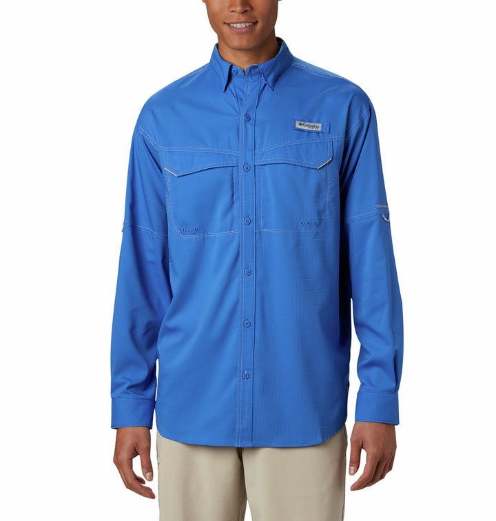 Camisa Columbia de manga larga en color azul vívido con bolsillos frontales y cuello.