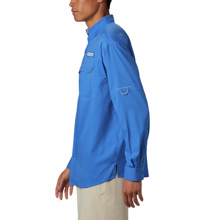 Camisa Columbia de manga larga en color azul vívido con bolsillos frontales y cuello.