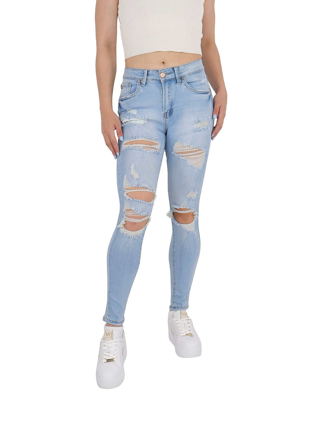 Pantalón de mezclilla azul claro ajustado con roturas decorativas en las rodillas y muslos para mujer.