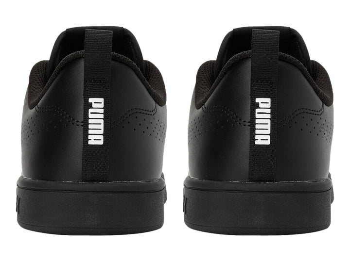 Tenis PUMA Smash Ace color negro, vista lateral, diseño deportivo y casual.
