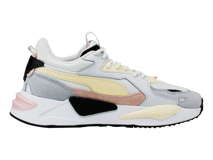 Tenis PUMA RS-Z Reinvent en colores blanco, gris, amarillo y rosa con suela robusta.