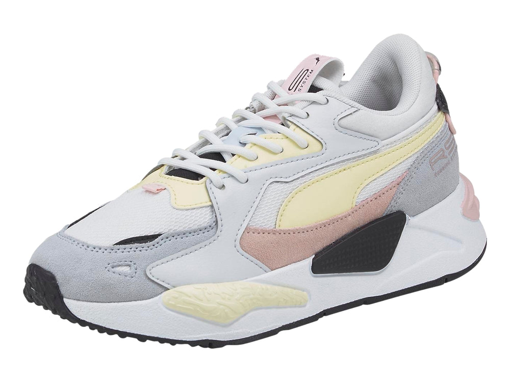 Tenis PUMA RS-Z Reinvent en colores blanco, gris, amarillo y rosa con suela robusta.