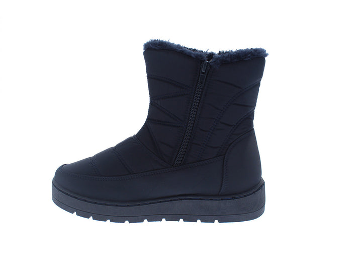 Botas Furor color azul marino con acabado acolchado, cierre lateral y forro interior de piel sintética.