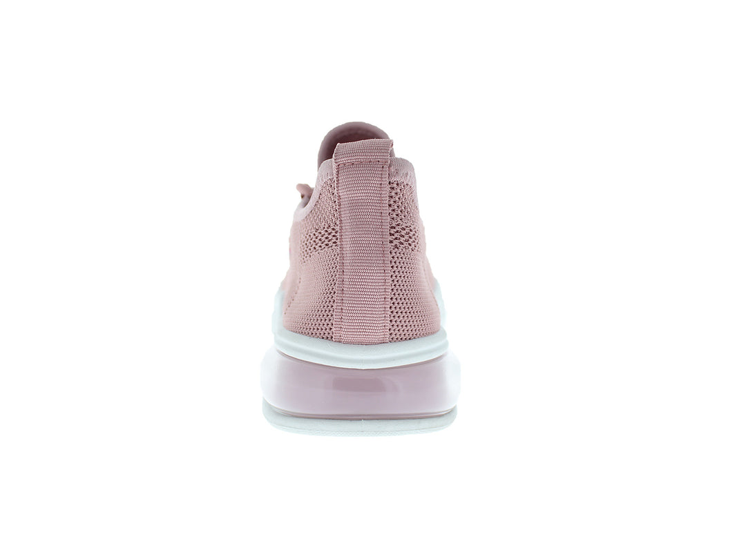 Tenis deportivos Furor para mujer en color rosa con suela blanca y detalles laterales multicolores.
