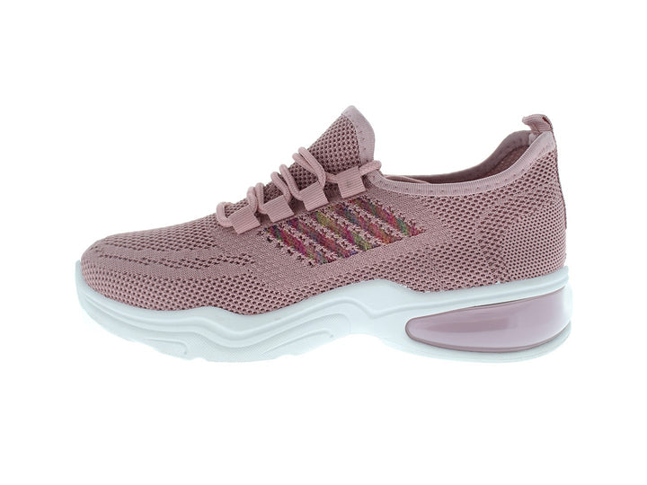 Tenis deportivos Furor para mujer en color rosa con suela blanca y detalles laterales multicolores.