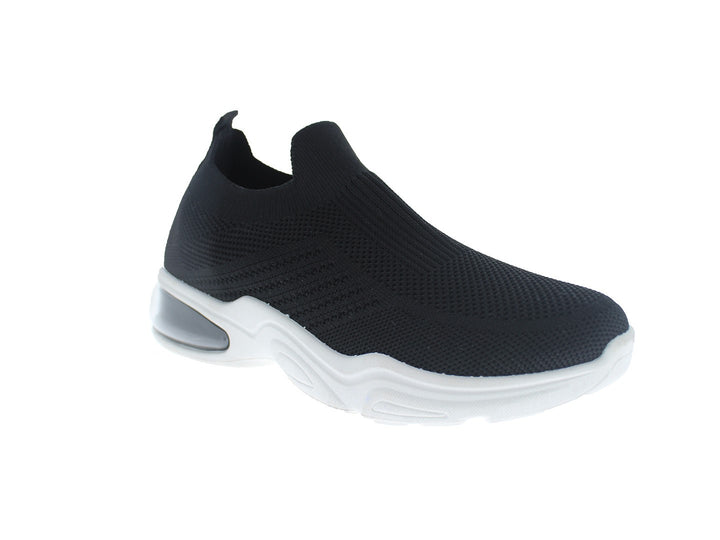 Tenis deportivos FUROR color negro con suela blanca, diseño slip-on sin cordones en tela transpirable.