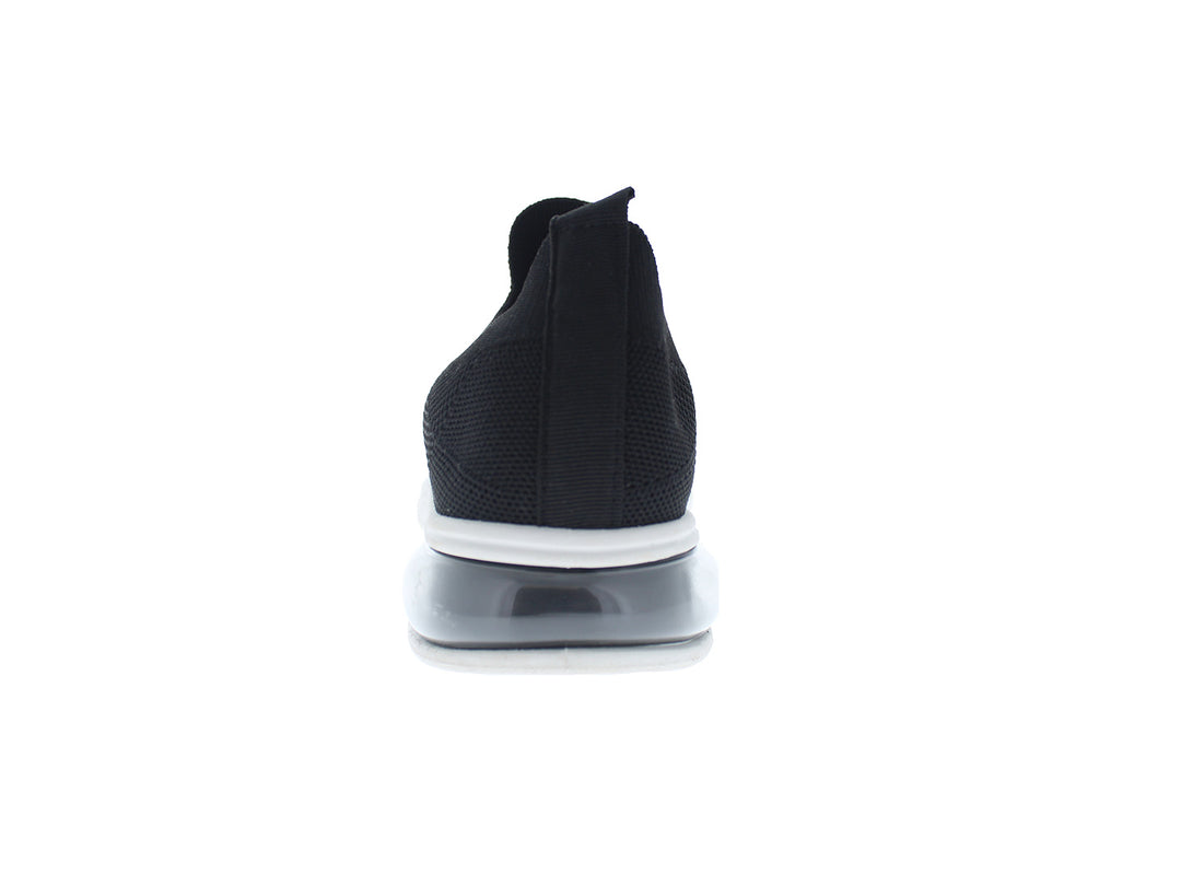 Tenis deportivos FUROR color negro con suela blanca, diseño slip-on sin cordones en tela transpirable.