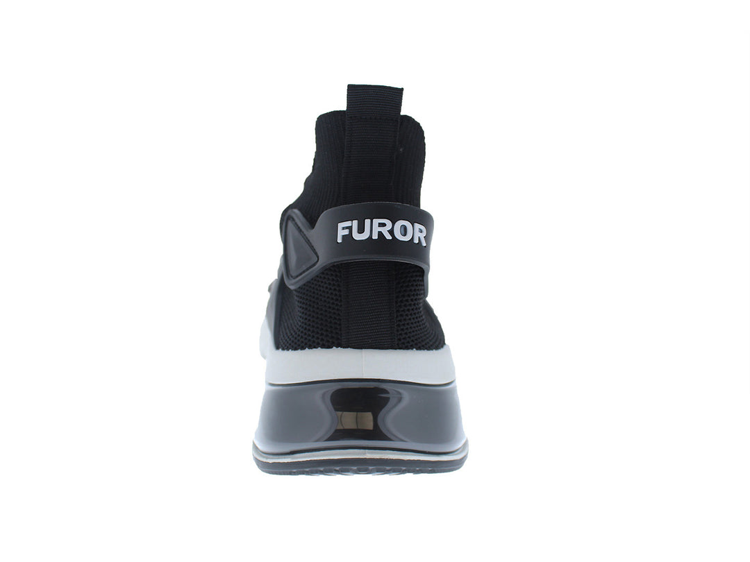 Tenis deportivos Furor color negro con suela blanca y gris, diseño de malla transpirable.