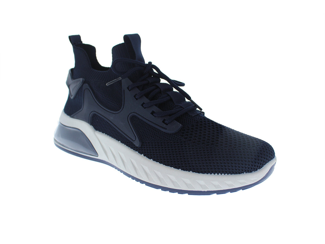 Tenis deportivos FUROR color navy con suela blanca y tejido transpirable.