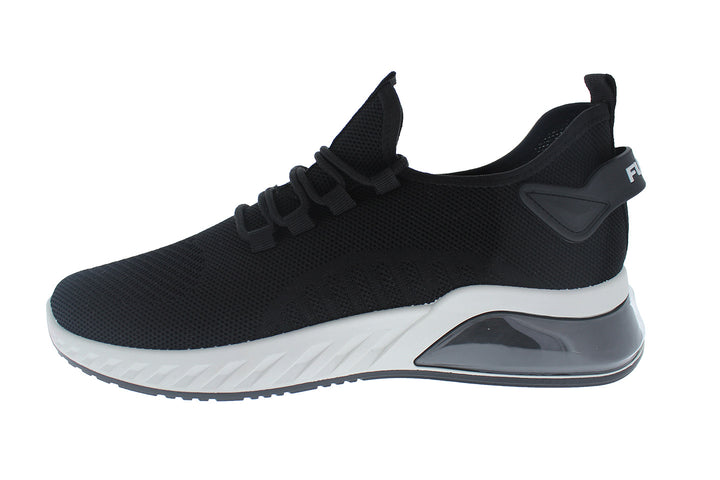 Tenis deportivos Furor de color negro con suela blanca y tejido transpirable.