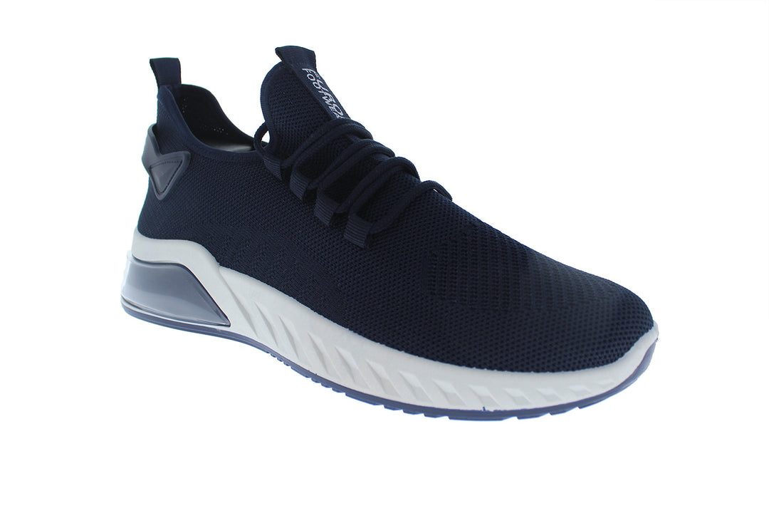Tenis deportivos Furor color navy con suela blanca y tejido transpirable.