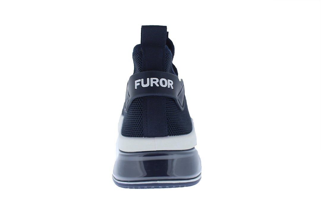 Tenis deportivos Furor color navy con suela blanca y tejido transpirable.