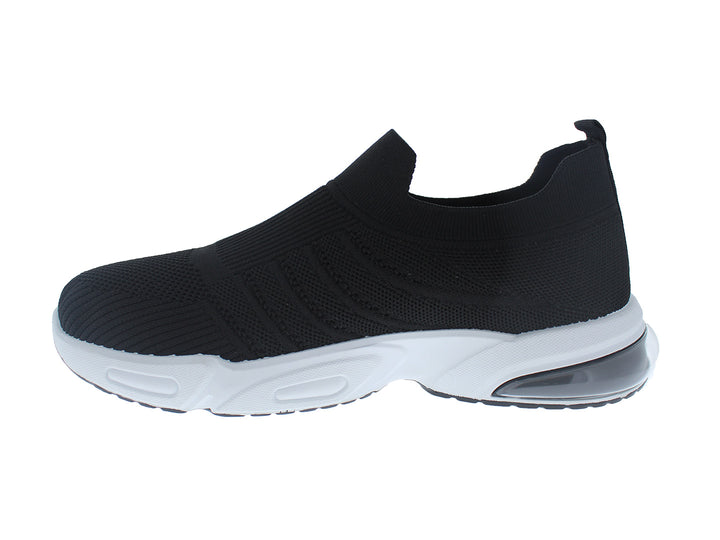 Tenis deportivos FUROR color negro con suela blanca, diseño slip-on de tela tejida.
