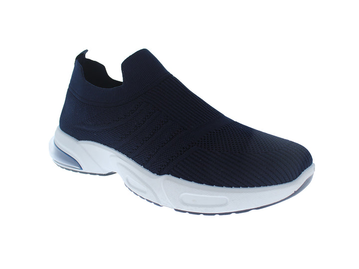 Tenis deportivos FUROR color azul marino con suela blanca, diseño sin cordones en tejido transpirable.